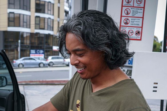 Christian Lale-Demoz fills up in Kensington on Friday.