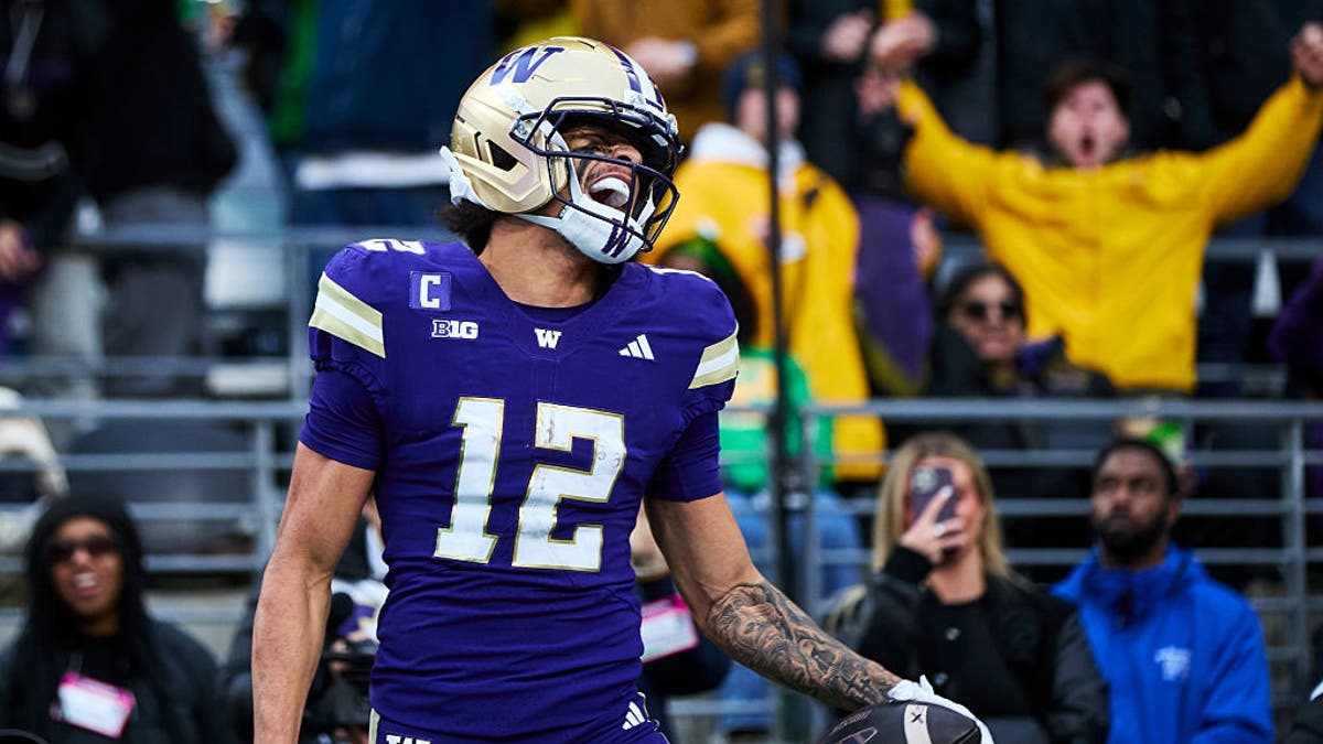 Denzel Boston celebrates after scoring a fourth-quarter touchdown against the Oregon Ducks at Husky Stadium last November. (Photo by Blake Dahlin/ISI Photos/ISI Photos via Getty Images)