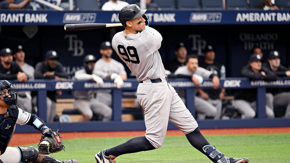 New York Yankees' Aaron Judge hitting a baseball during a game.