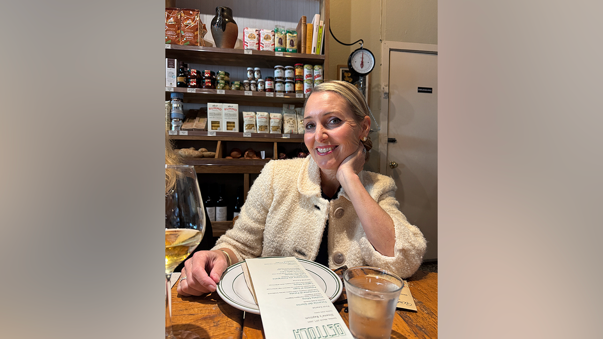 Amy Hillyard seated at a restaurant table in an undated photo