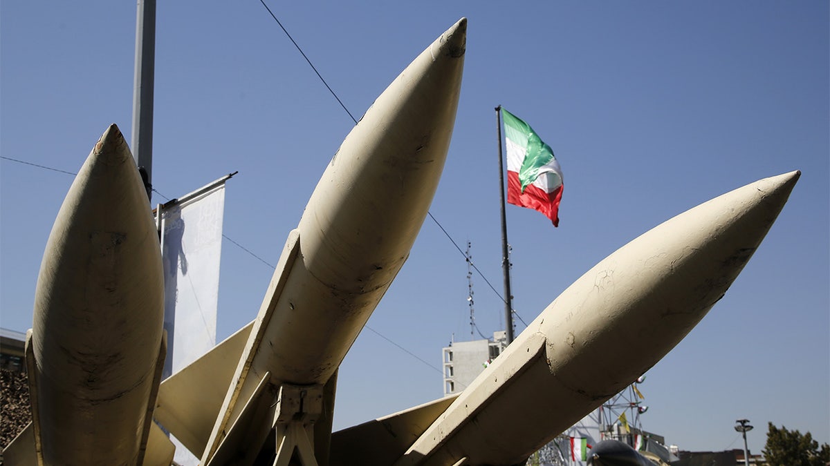 Heavy weapons including ballistic missiles and air defense systems displayed at Baharestan Square in Tehran