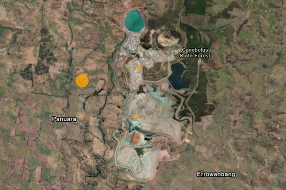 The approxiamate location of the earthquake’s epicentre (large orange dot) and aftershocks (smaller dots within the mine site) on Tuesday night.