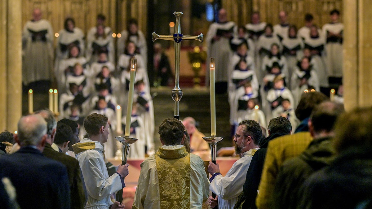 Christmas morning Eucharist service at Canterbury Cathedral with clergy and congregation
