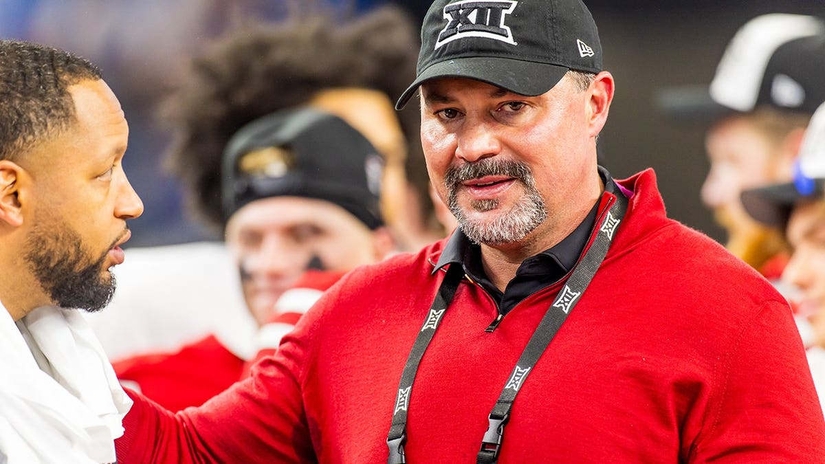 Cody Campbell standing on the field at AT&T Stadium in Arlington, Texas