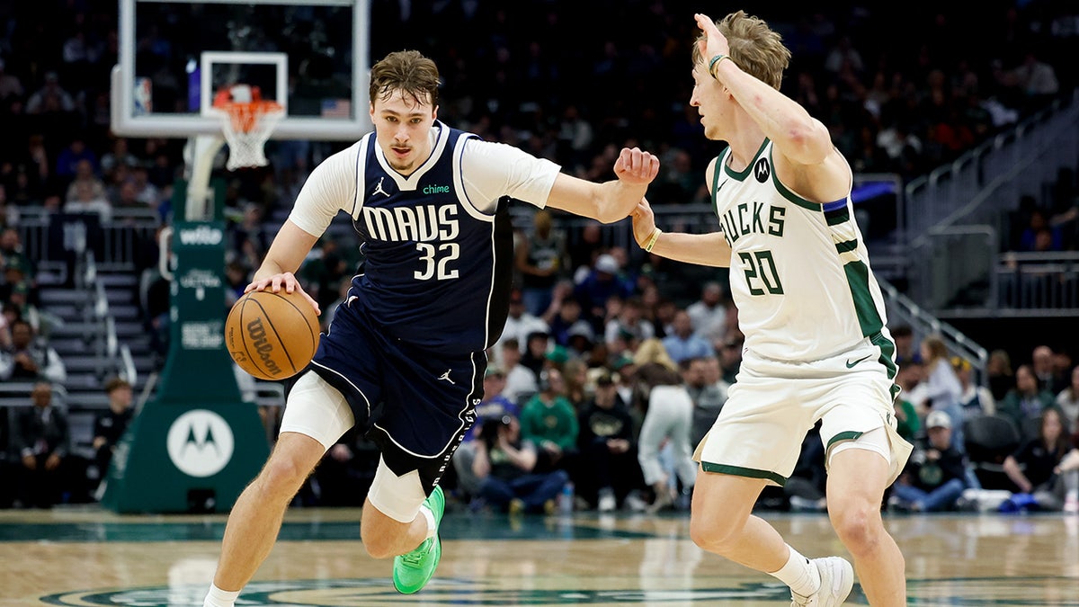 Cooper Flagg drives to basket