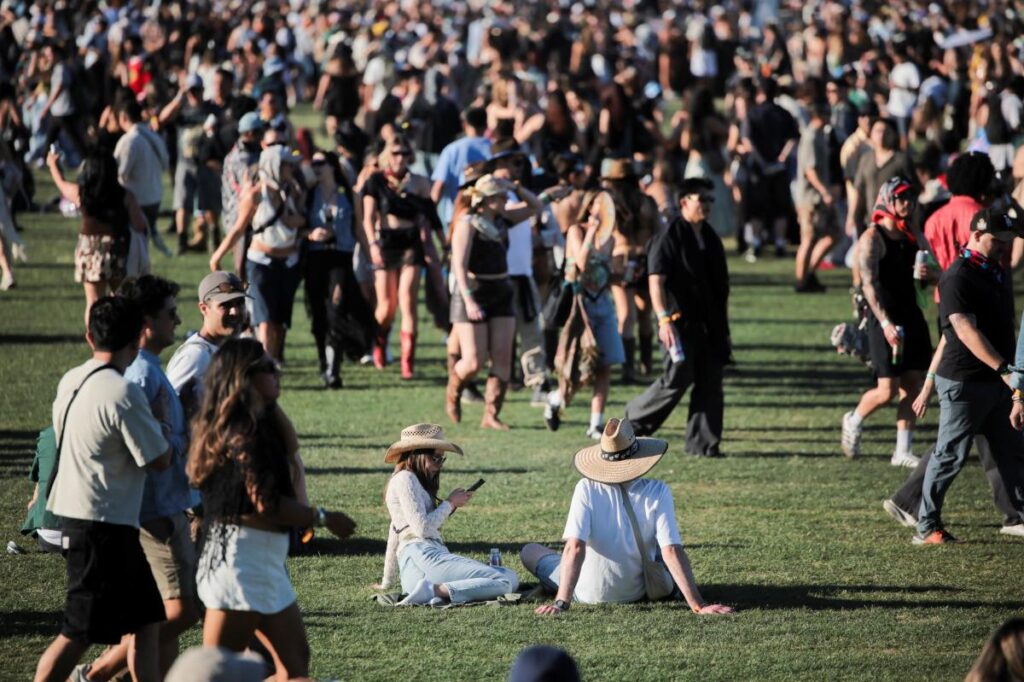Scantily-clad festivalgoers stuck in Coachella hell in desert heat Scantily-clad festivalgoers stuck in Coachella hell in desert heat