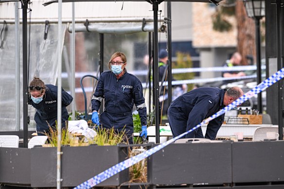 Police officers at the scene after the shooting.