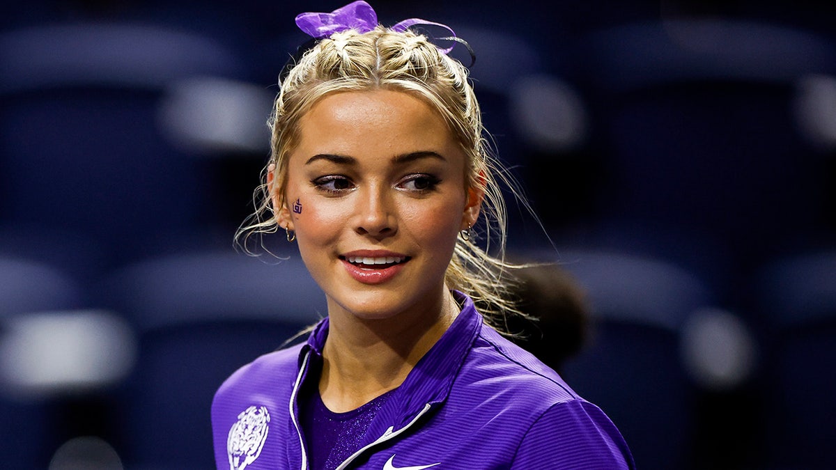 Olivia Dunne of the LSU Tigers looking on before a gymnastics meet