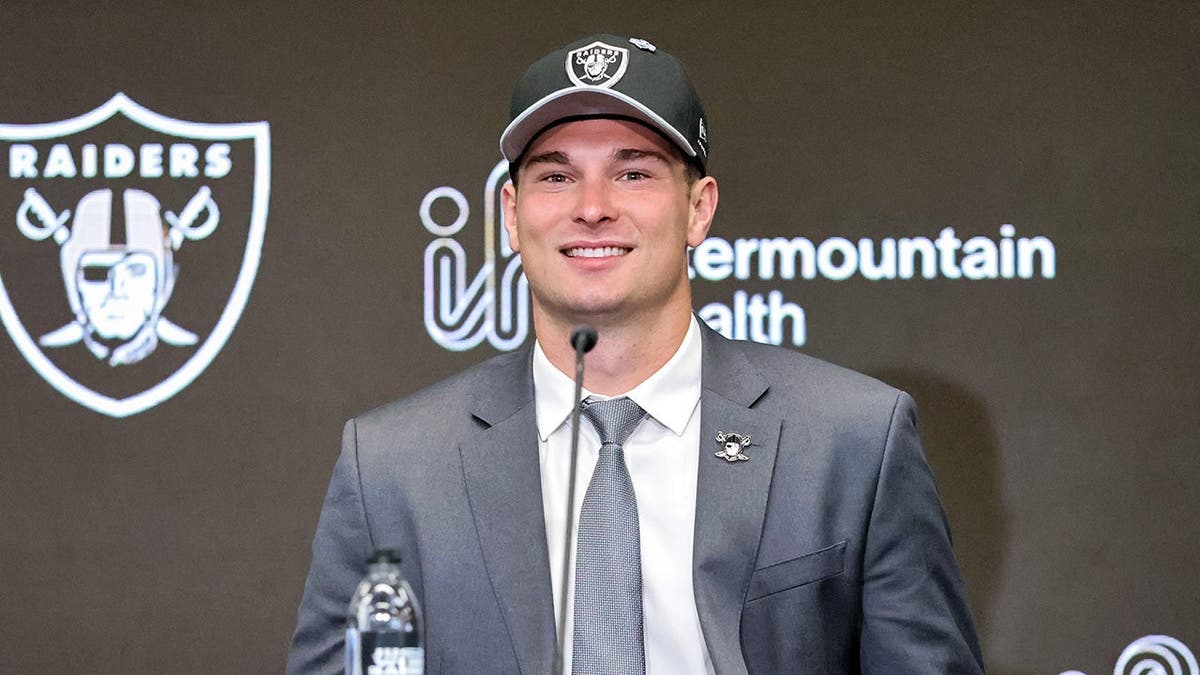 Quarterback Fernando Mendoza speaking at a news conference in Henderson, Nevada.