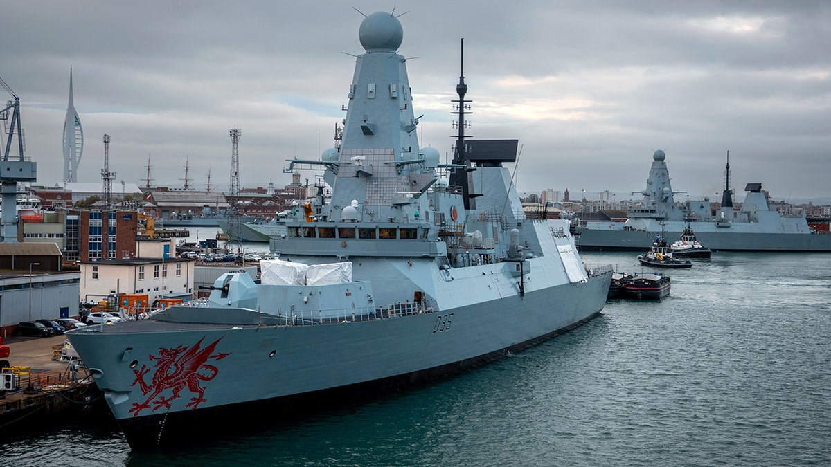 The Type 45 destroyer HMS Dragon moored in the Royal Navy Dockyard in Portsmouth, England