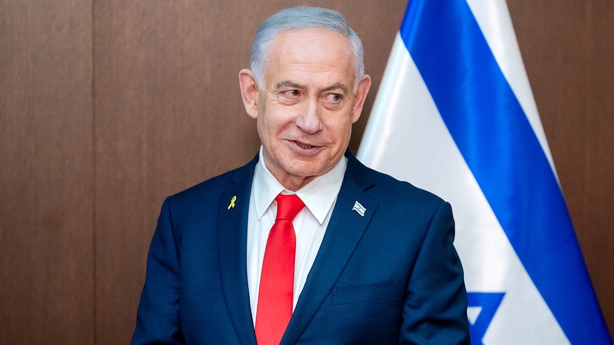 Israeli Prime Minister Benjamin Netanyahu meeting with U.S. Vice President J.D. Vance in an office.