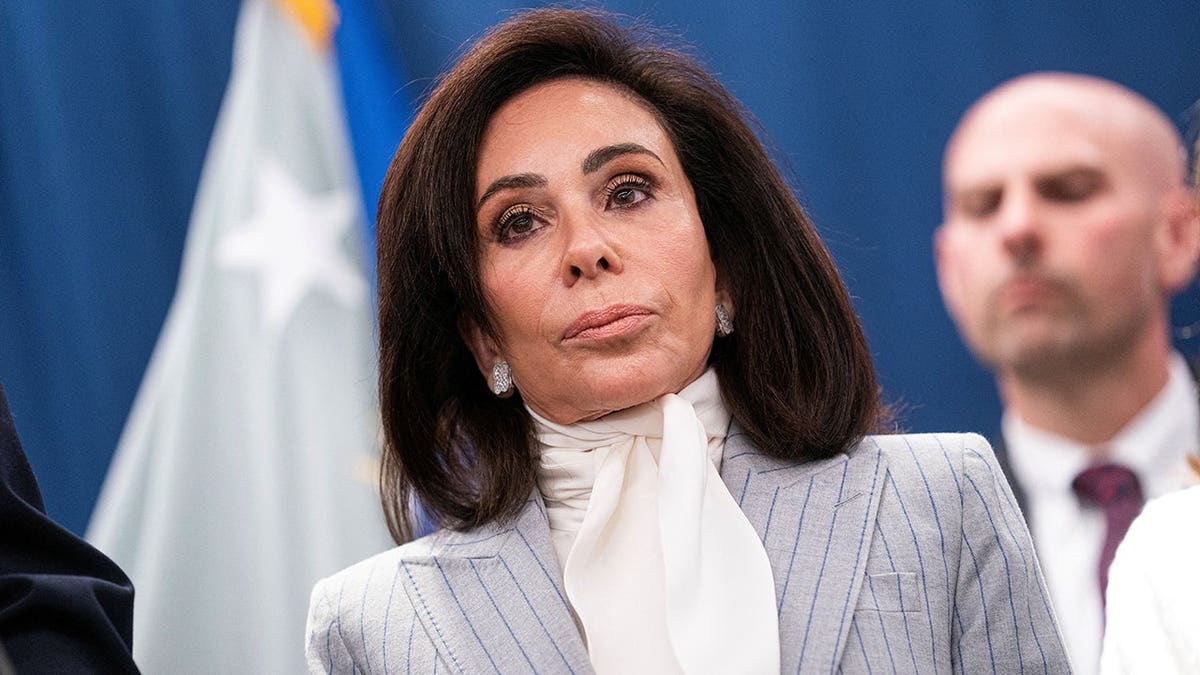 U.S. Attorney Jeanine Pirro looking on during a press conference at the Justice Department in Washington D.C.