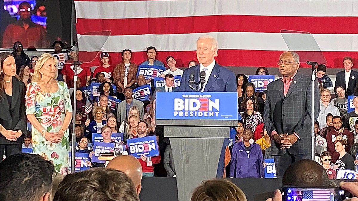 Then-Vice President Joe Biden giving victory speech flanked by wife Jill Biden and Rep. Jim Clyburn