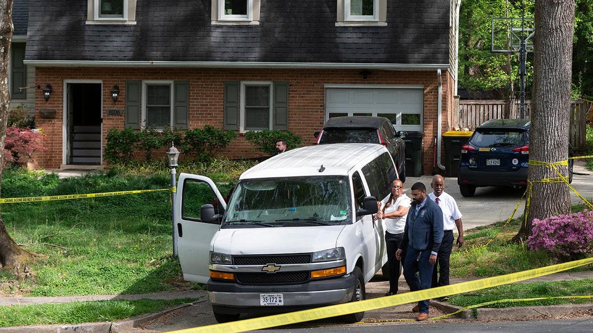 Fairfax County coroners preparing to leave former Virginia Lt. Gov. Justin Fairfax's home with two bodies in a van
