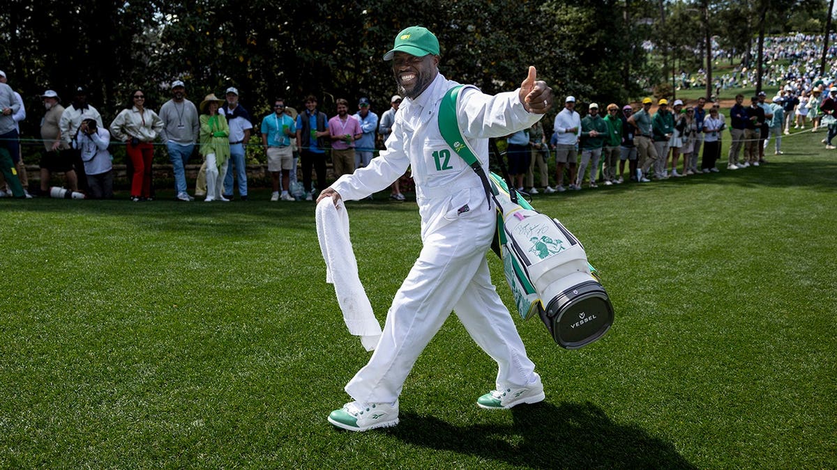 Comedian Kevin Hart walking at Augusta National Golf Club