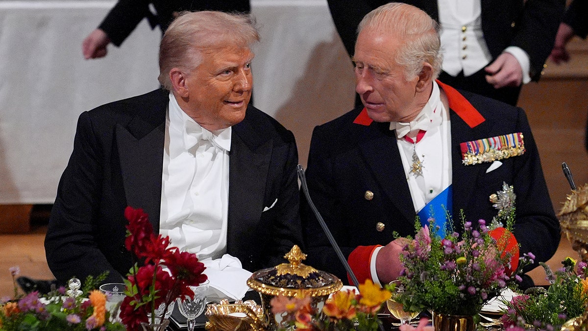 President Trump and King Charles in mid conversation during the state dinner at Windsor Castle.