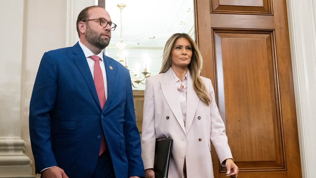 US First Lady Melania Trump and committee Chairman Representative Jason Smith (L), Republican of Missouri, arrive to attend a House Ways and Means Committee roundtable discussion.