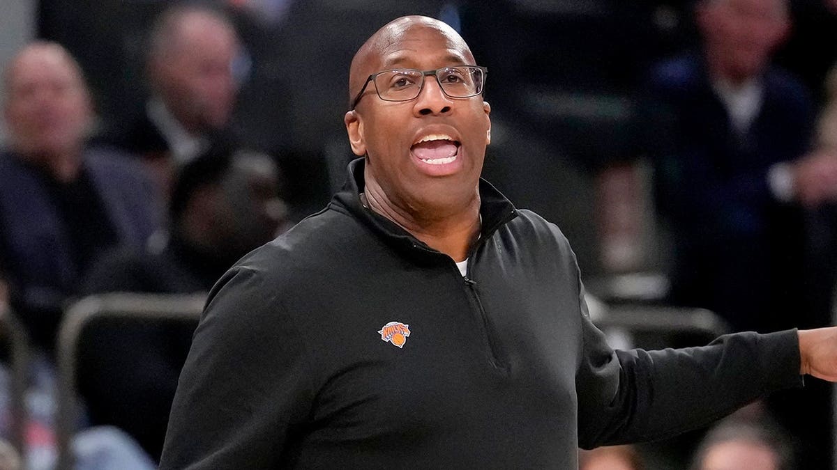 New York Knicks head coach Mike Brown yelling during an NBA game.
