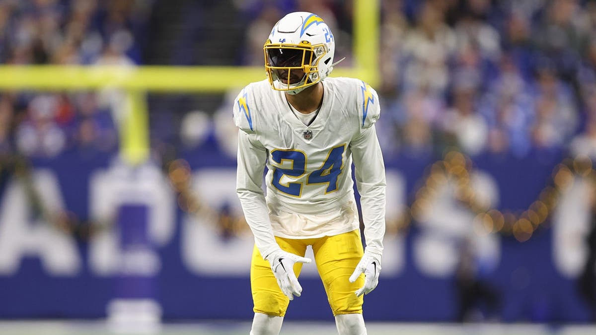 Nasir Adderley wearing number 24 Los Angeles Chargers jersey covering during NFL game at Lucas Oil Stadium
