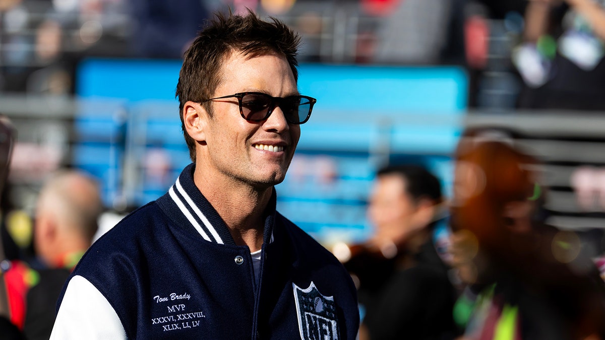 Tom Brady standing in Levi's Stadium before Super Bowl LX.