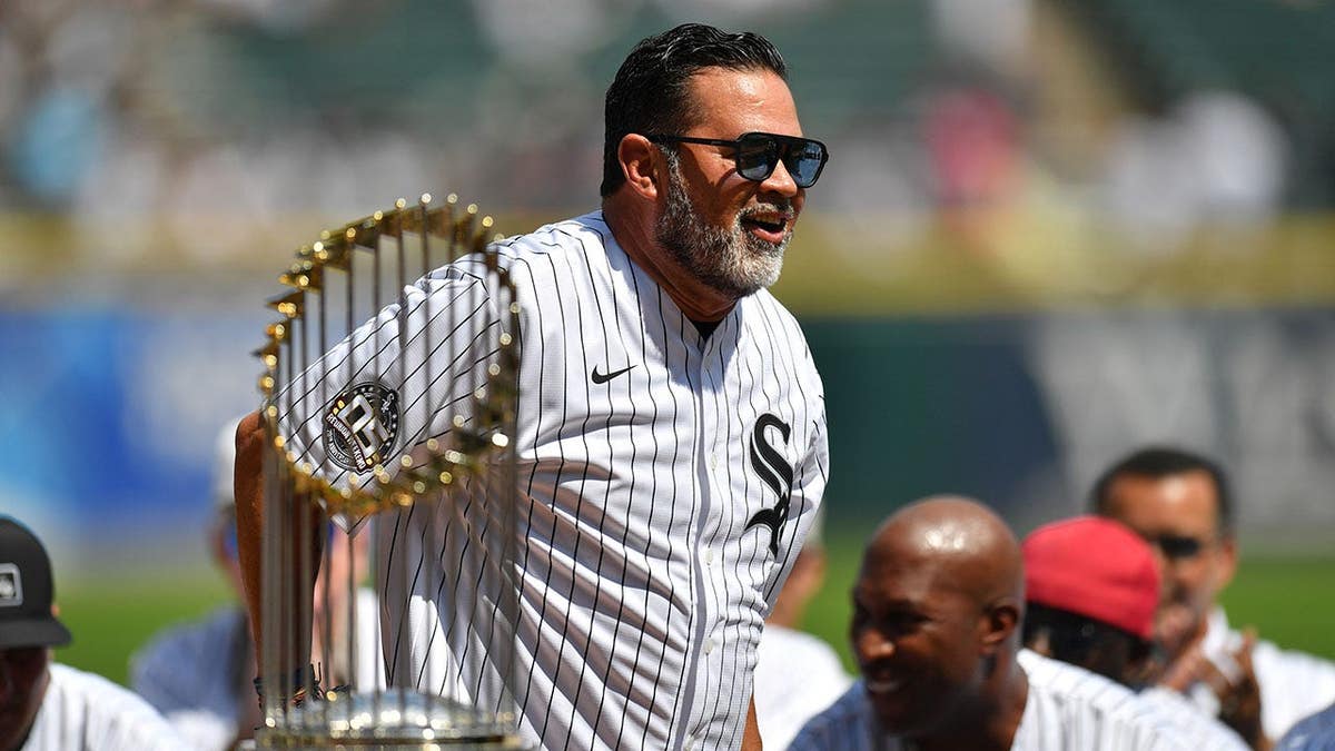 Former manager Ozzie Guillen standing on the field at Rate Field