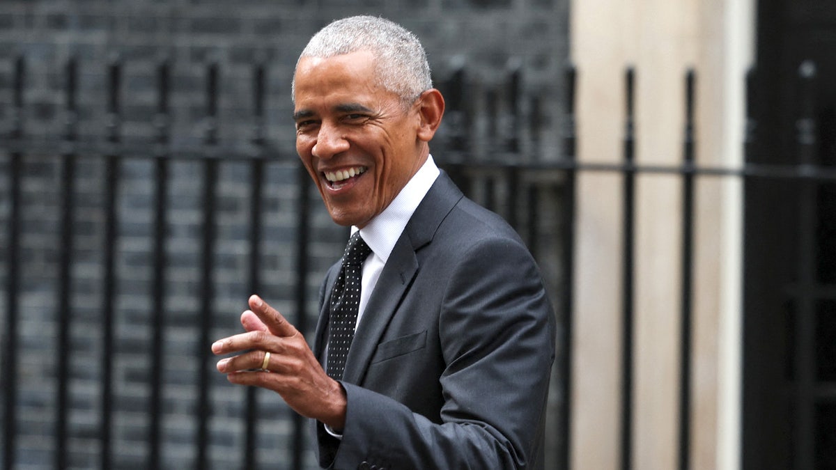 Former President Barack Obama reacting as he leaves 10 Downing Street in London