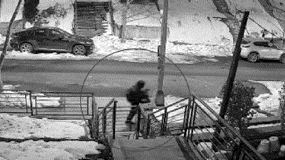 Exterior photo from surveillance video of suspect