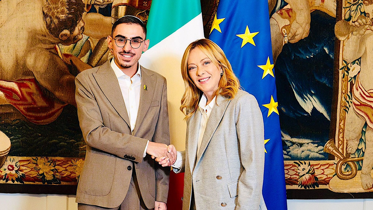 Rom Braslavski with Italian PM Meloni