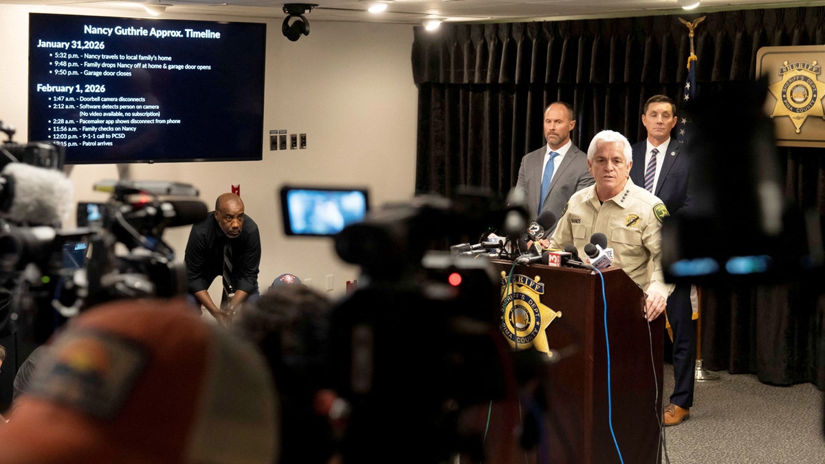 Pima County Sheriff Chris Nanos speaking at a microphone during a press conference
