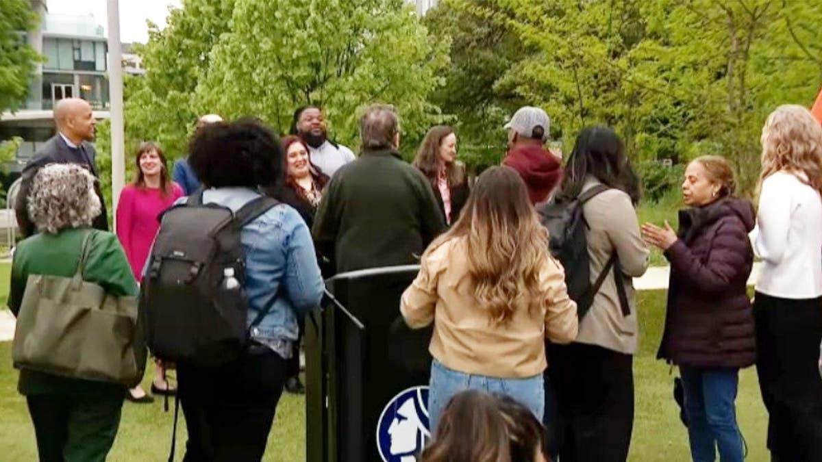 attendees at a press conference in seattle