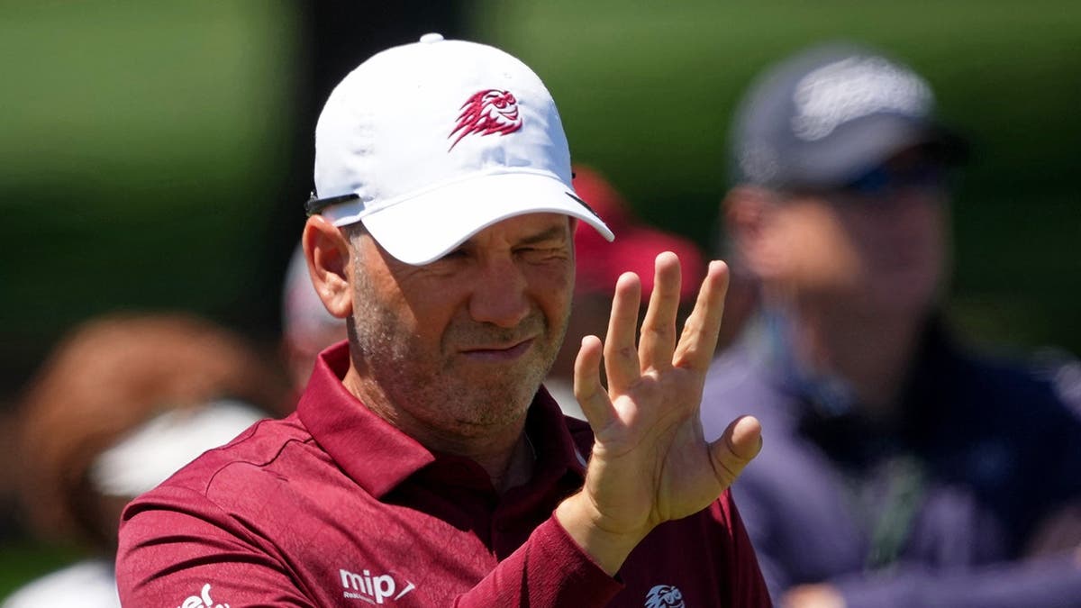 Sergio Garcia lining up a putt on the second green at Augusta National Golf Club