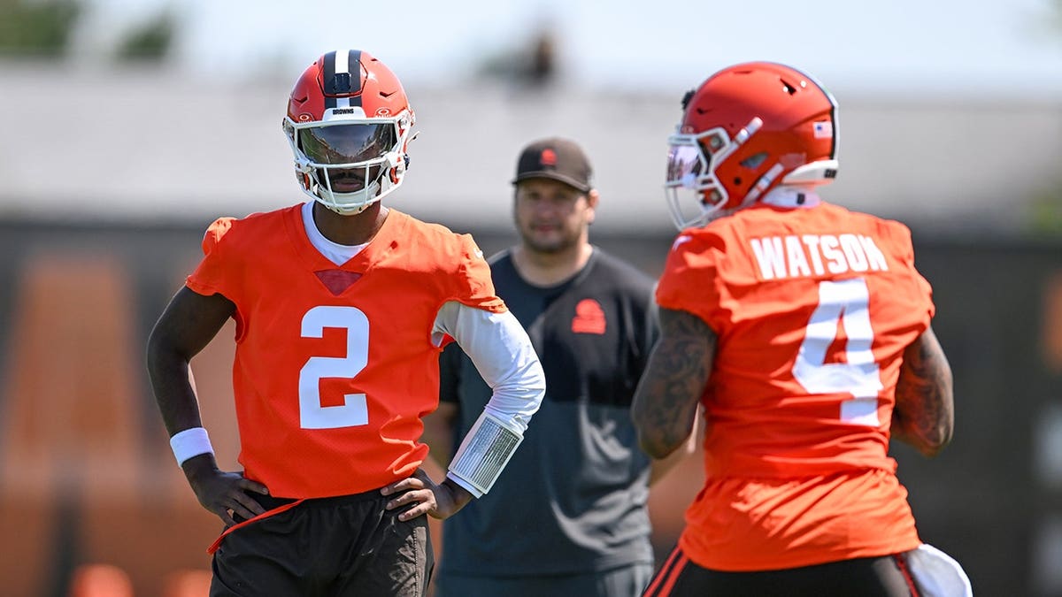 Shedeur Sanders watching Deshaun Watson run a drill at Browns minicamp in Berea Ohio