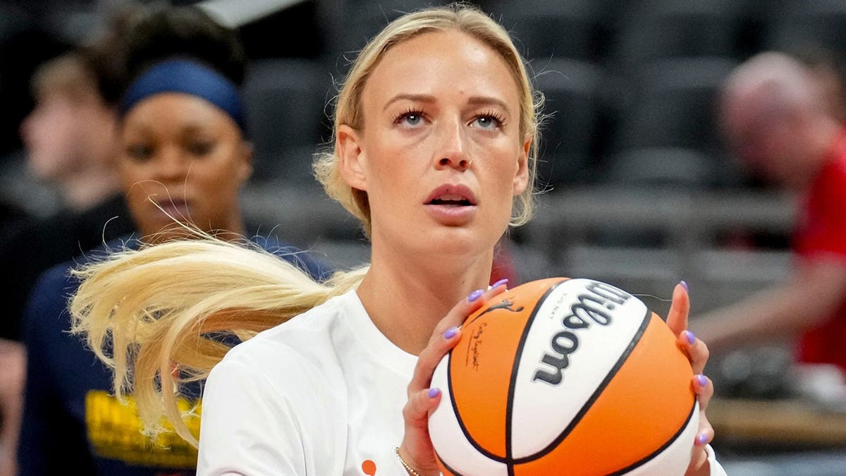 Indiana Fever guard Sophie Cunningham warming up at Gainbridge Fieldhouse
