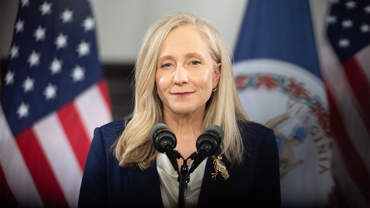 Virginia Gov. Abigail Spanberger speaking at a podium delivering a response