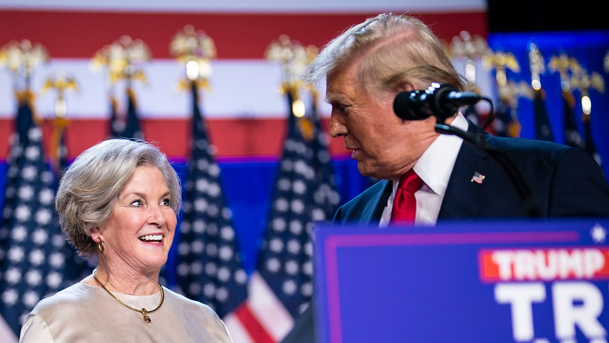 Susie Wiles speaking with former President Donald Trump at an election night watch party