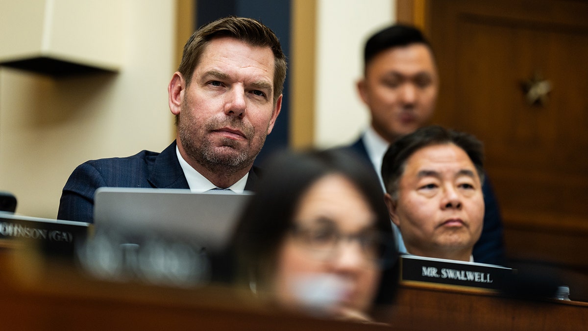 Rep. Eric Swalwell sits during a hearing.
