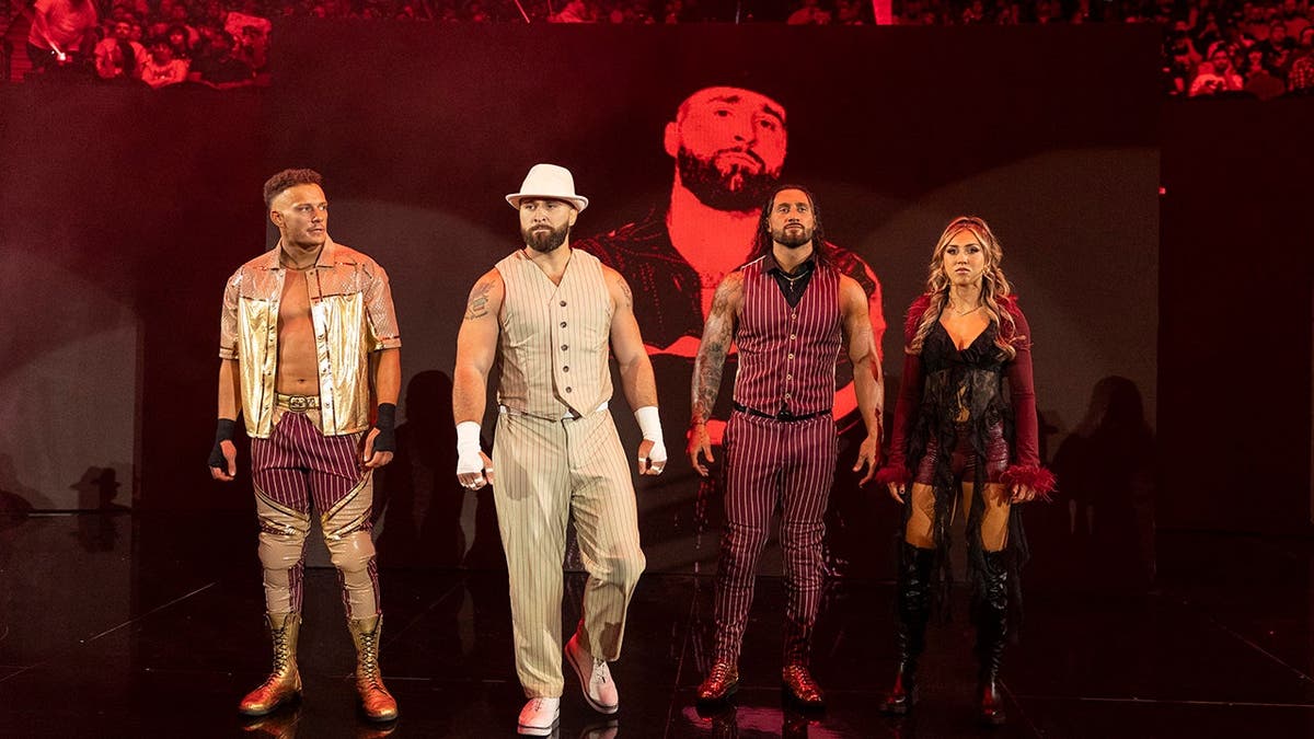 Channing Stacks Lorenzo, Tony D'Angelo, Luca Crusifino, and Adriana Rizzo posing at NXT Stand and Deliver event