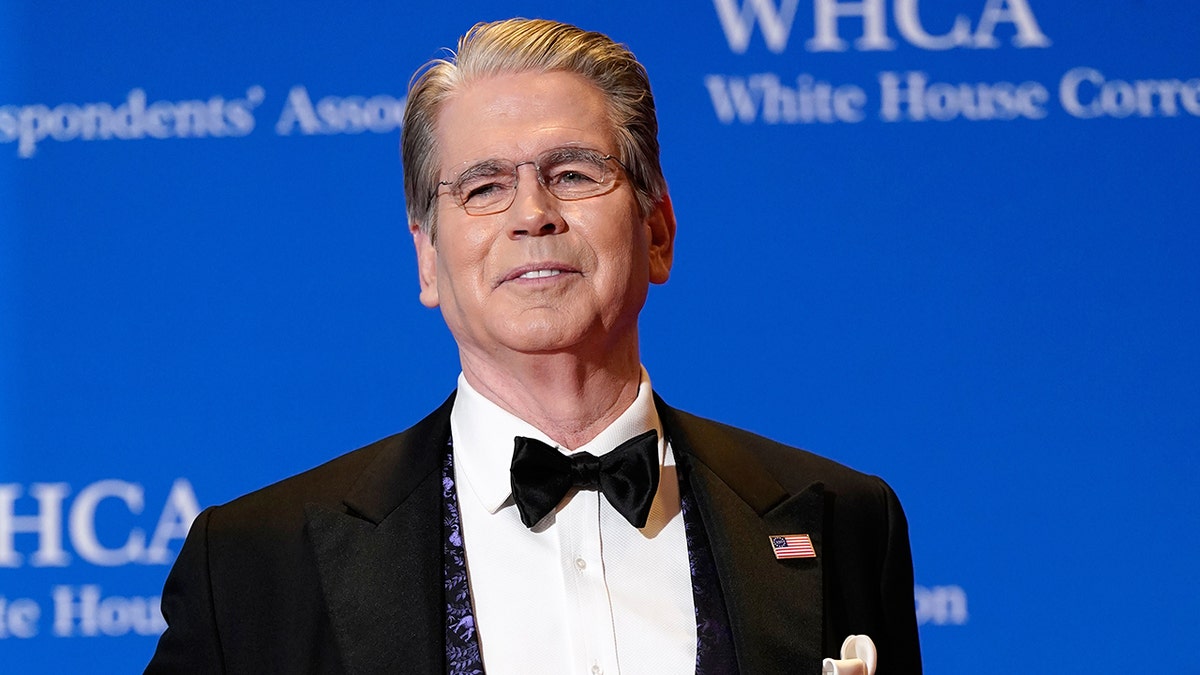 Treasury Secretary Scott Bessent posing for photographers at White House Correspondents' Association Dinner