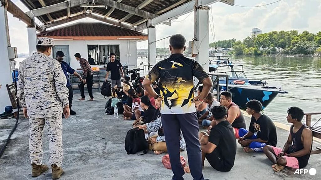 Malaysia ends Indonesia migrant boat search, 16 bodies recovered