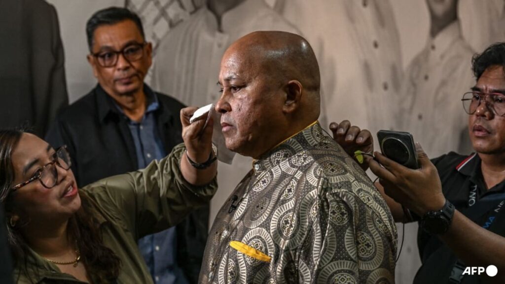 Gunshots fired as chaos erupts at Philippine Senate where lawmaker wanted by ICC holds out
