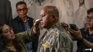 Gunshots fired as chaos erupts at Philippine Senate where lawmaker wanted by ICC holds out