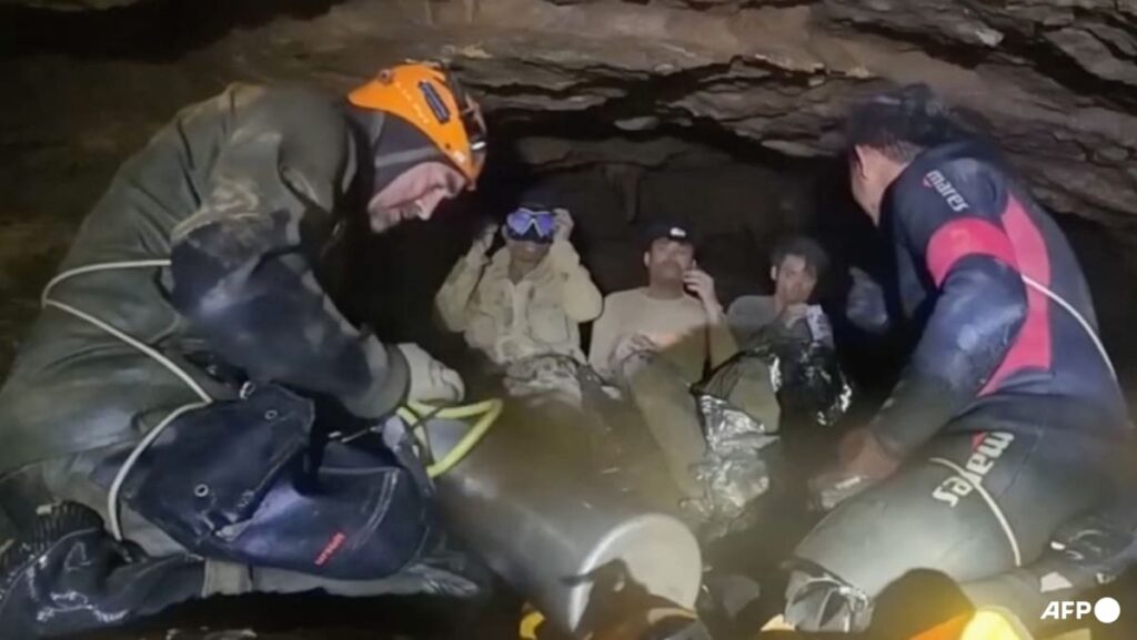 Rescuers free four more men trapped in semi-submerged Laos cave