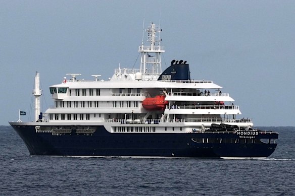 The MV Hondius anchored at a port in Praia, Cape Verde.
