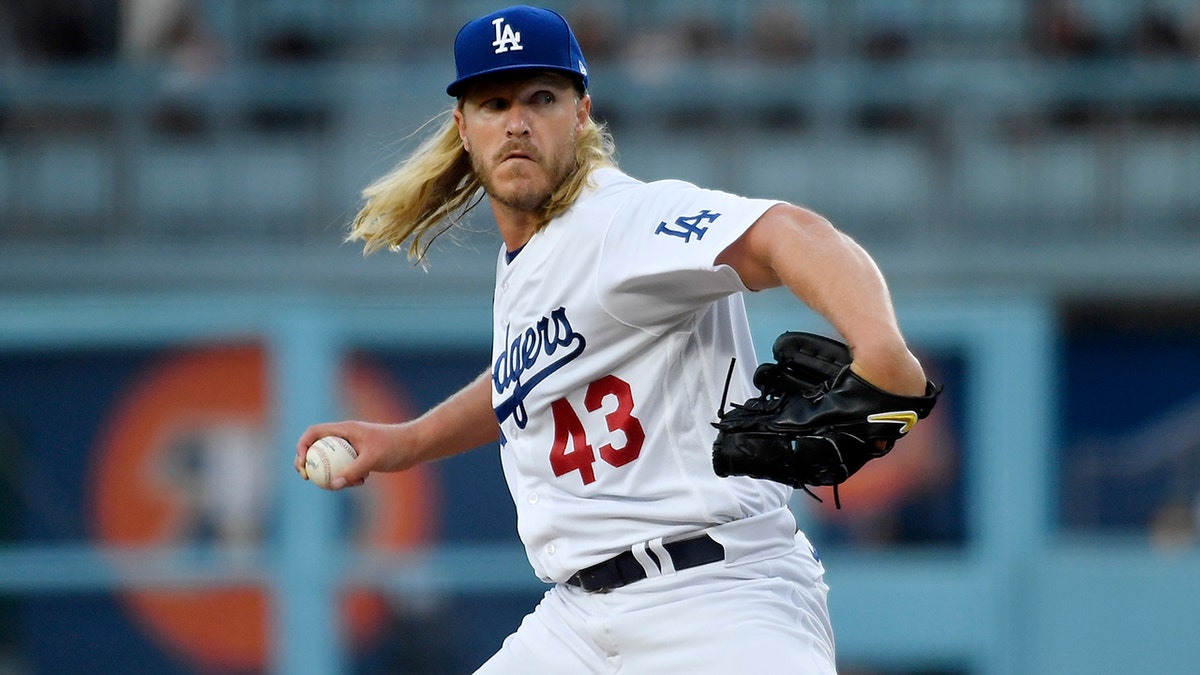 Noah Syndergaard pitching for the Los Angeles Dodgers at Dodger Stadium