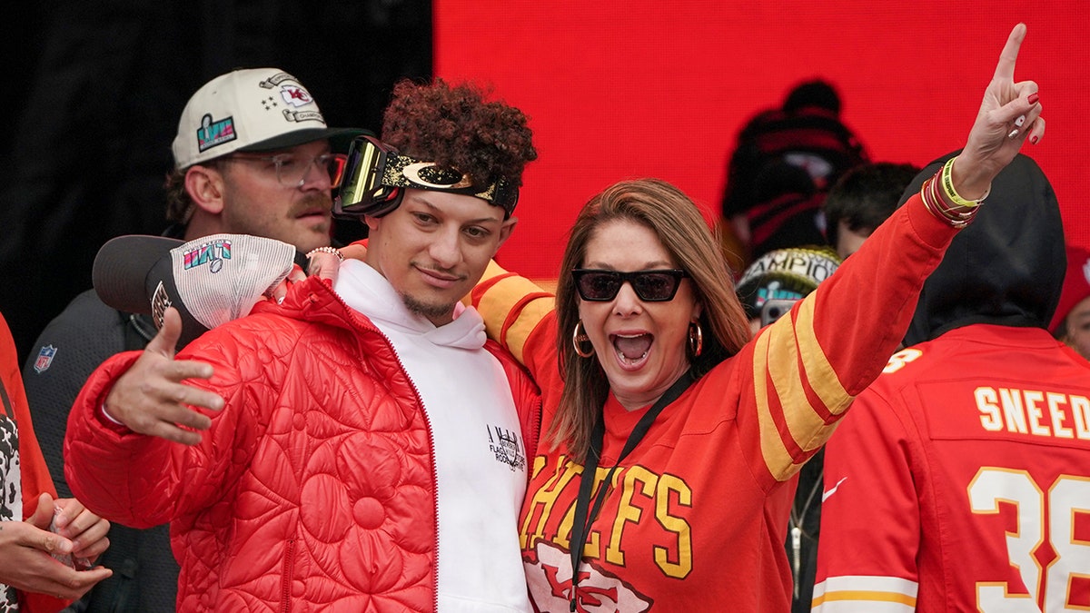 Patrick Mahomes celebrating with his mother Randi Martin at a parade