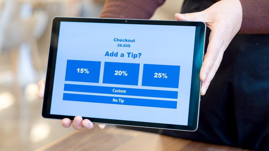 Automatic tipping programs spark concern as restaurants prepare for flood of visitors Automatic tipping programs spark concern as restaurants prepare for flood of visitors