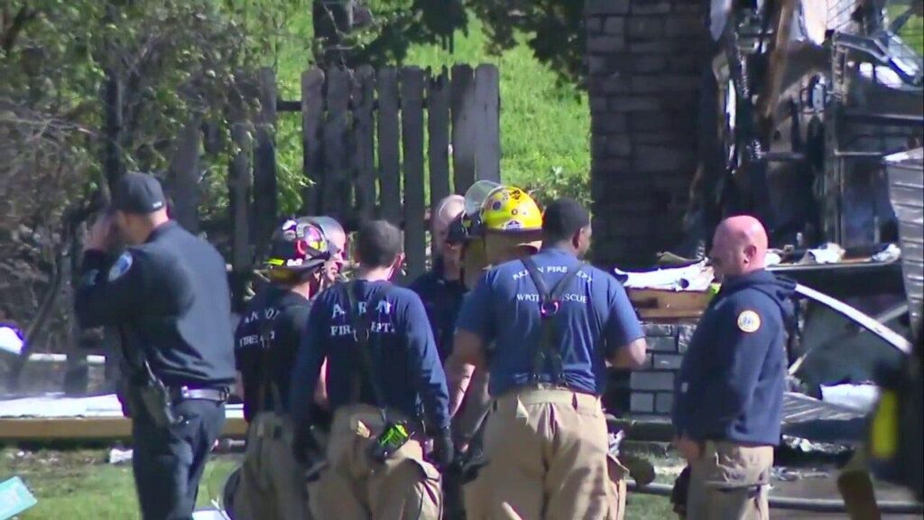 Small plane crashes into Ohio home killing 2 on board, igniting blaze in residential area