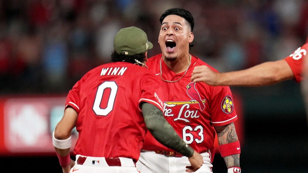 Shirtless Cardinals fans take over empty section in electric scene during walk-off win over the Royals