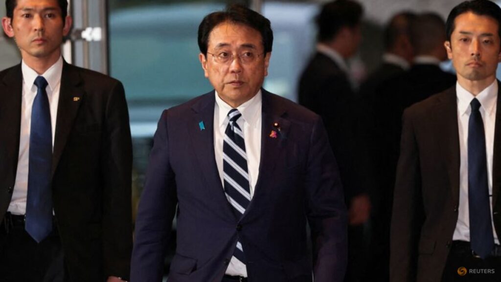 Japan trade minister holds brief talks with Chinese counterpart amid diplomatic row Japan trade minister holds brief talks with Chinese counterpart amid diplomatic row