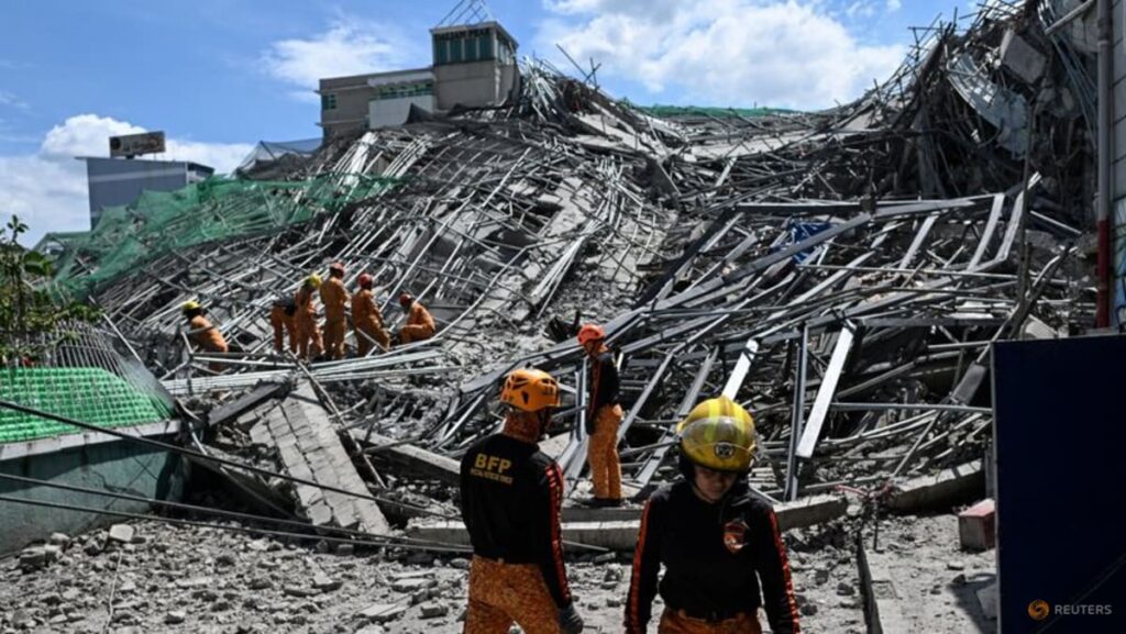 Search ongoing for over 20 trapped after Philippines building collapse